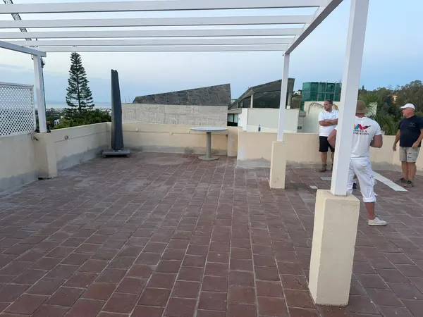 Marbella roof terrace before work: aged terracotta tiles