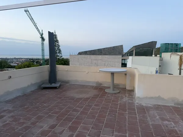 Marbella roof terrace before work, with the original terracotta tiles
