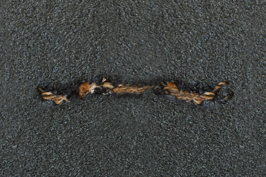 Split in the felt before repair