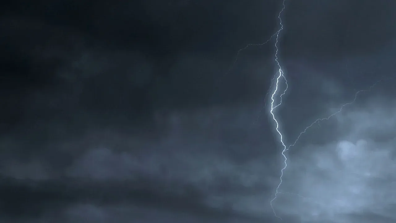 Lightning over dark storm clouds